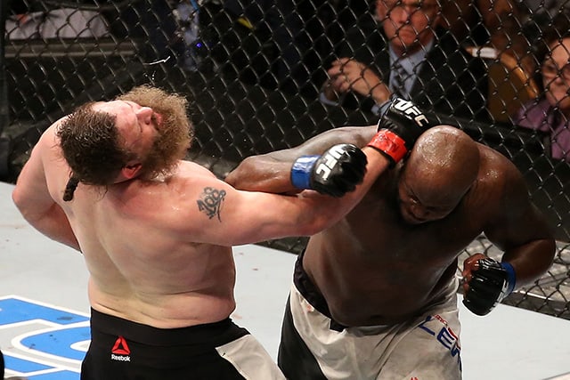 LAS VEGAS, NV - JULY 07: (R-L) Derrick Lewis punches Roy Nelson in their heavyweight bout during the UFC Fight Night event inside the MGM Grand Garden Arena on July 7, 2016 in Las Vegas, Nevada. (Photo by Ed Mulholland/Zuffa LLC/Zuffa LLC via Getty Images)