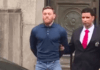 WATCH: Handcuffed Conor McGregor Heckled by Fans
