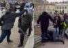 WATCH: Former Boxing Champion Attacks Riot Police With Bare Fists