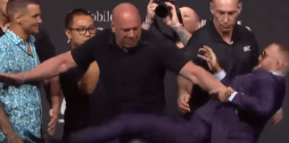 Conor McGregor throws a KICK against Poirier in their faceoff