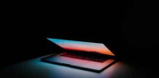 The Most Happening Technology Trends for 2022 gray and black laptop computer on surface