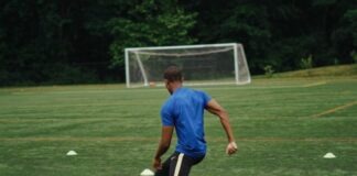Top 7 Soccer Shooting Drills That You Need to Try man in blue shirt playing soccer during daytime