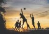 The World of Volleyball in Canada and the World: History and Rules silhouette of people playing basketball during sunset
