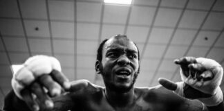 8 MMA Fighters Who Have Brain Damage grayscale photo of boxer