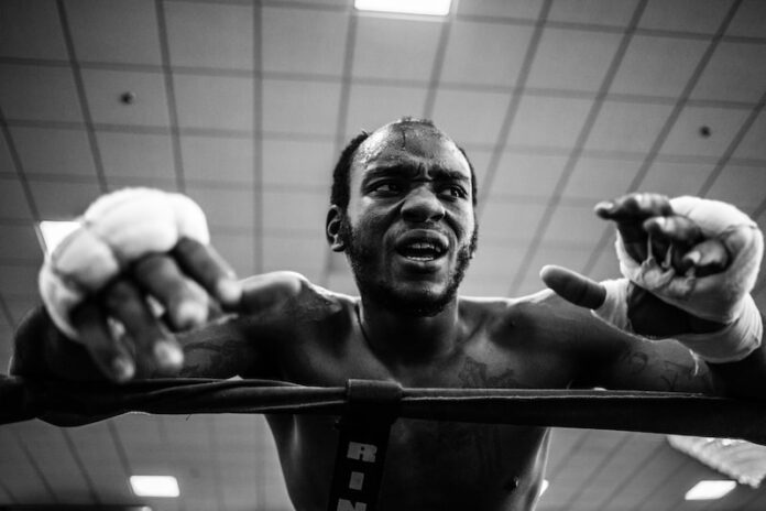 Photo by Wade Austin Ellis grayscale photo of boxer