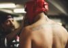 Inspirational Success Stories From UFC Fighters person using training helmet inside the ring