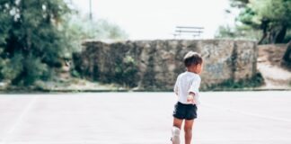 3 Benefits of Getting Your Kids Into Running toddler running on gray concrete floor