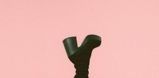 Common misconceptions about anal escorts a person laying on the ground with their legs crossed